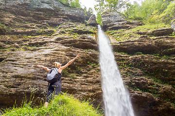 Image showing Active sporty woman relaxing in beautiful nature.