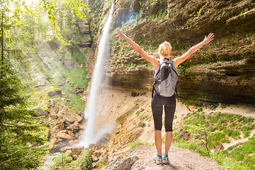 Image showing Active sporty woman relaxing in beautiful nature.