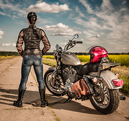 Image showing Biker girl on a motorcycle