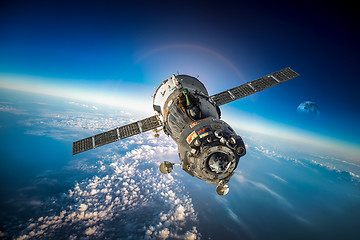 Image showing Spacecraft Soyuz over the planet earth