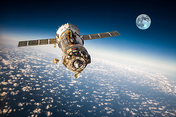 Image showing Spacecraft Soyuz over the planet earth