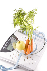 Image showing carrots, apple and measuring objects