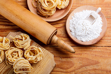 Image showing Rolling pin and pasta