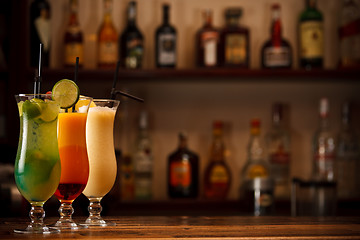 Image showing Three tropical mixed drinks