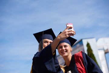 Image showing students group in graduates making selfie
