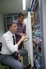Image showing network engineers in server room