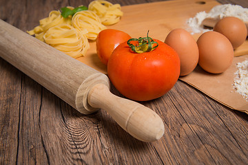 Image showing Raw pasta, tomato and eggs