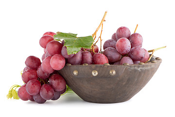 Image showing Fresh red grapes in wood bown