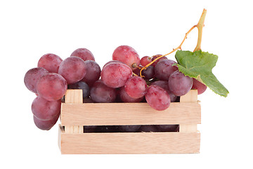 Image showing Red grapes in wooden crate