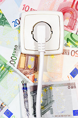 Image showing Banknotes and Power socket