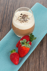 Image showing Chocolate mousse and strawberries