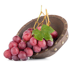 Image showing Fresh red grapes in wood bown