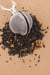 Image showing Black dry tea with petals