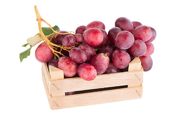 Image showing Red grapes in wooden crate