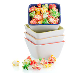 Image showing Pile of ceramic bowls of popcorn