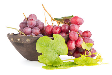 Image showing Fresh red grapes in wood bown