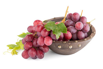 Image showing Fresh red grapes in wood bown