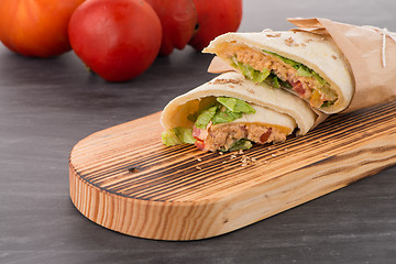 Image showing Tortilla with chicken and vegetables