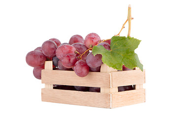 Image showing Red grapes in wooden crate