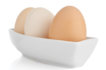 Image showing Brown eggs in white ceramic bowl