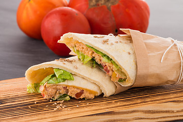 Image showing Tortilla with chicken and vegetables