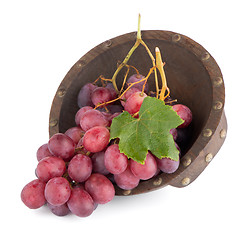 Image showing Fresh red grapes in wood bown