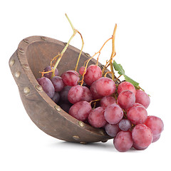 Image showing Fresh red grapes in wood bown