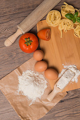 Image showing Raw pasta, tomato and eggs