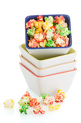 Image showing Pile of ceramic bowls of popcorn