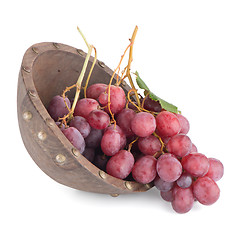 Image showing Fresh red grapes in wood bown