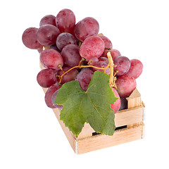 Image showing Red grapes in wooden crate