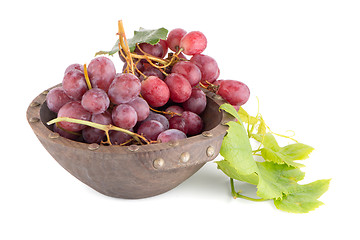 Image showing Fresh red grapes in wood bown