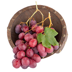 Image showing Fresh red grapes in wood bown