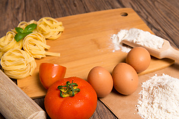 Image showing Raw pasta, tomato and eggs