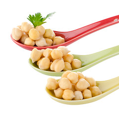Image showing chickpeas over spoons