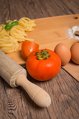 Image showing Raw pasta, tomato and eggs