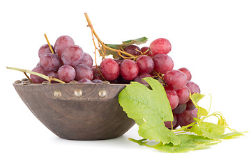 Image showing Fresh red grapes in wood bown