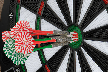 Image showing Dart board with darts