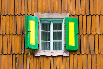 Image showing Colorful vintage wooden window shutters.