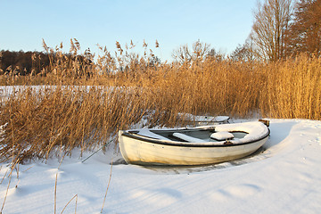 Image showing Boat at the lake in winter