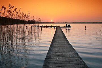 Image showing Lake in denmark with a jetty in winter shot with colour graduate