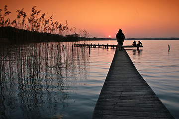 Image showing Lake in denmark with a jetty in winter shot with colour graduate