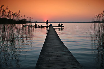 Image showing Lake in denmark with a jetty in winter shot with colour graduate