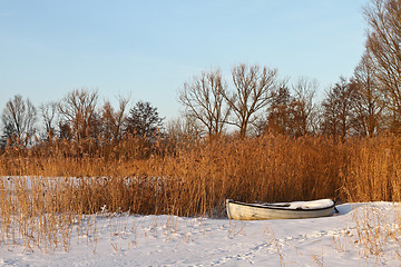 Image showing Boat at the lake in winter