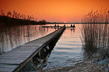 Image showing Lake in denmark with a jetty in winter shot with colour graduate