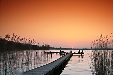 Image showing Lake in denmark with a jetty in winter shot with colour graduate