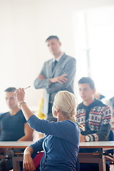 Image showing group of students with teacher on class