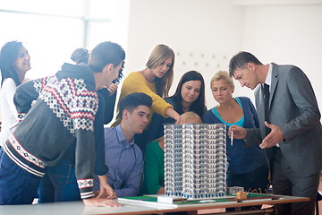 Image showing group of students with teacher on class