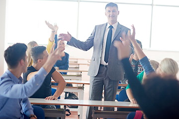 Image showing group of students with teacher on class