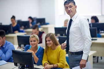 Image showing students with teacher  in computer lab classrom